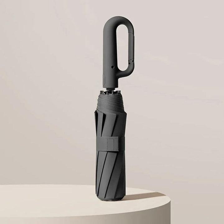 Sort kompakt automatisk paraply, vindfast og rejsevenlig, perfekt til unisex regnbeskyttelse.