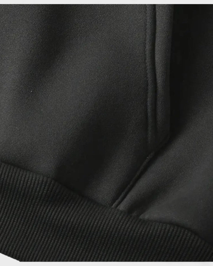 Hvid unisex fleece hættetrøje med lynlås. Varm og holdbar til alle årstider.