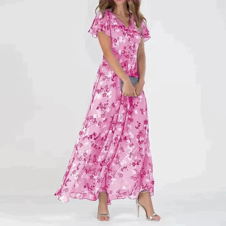 Kvinders elegante blomstrede maxi kjole med V-hals, let fald og alsidigt design.
