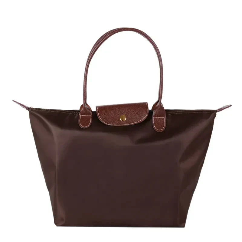 Perfekt gave: stilfuld dame håndtaske. Elegant og funktionel shopper til den modebevidste kvinde.