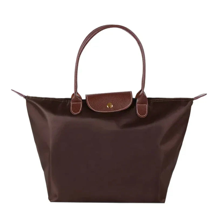 Perfekt gave: stilfuld dame håndtaske. Elegant og funktionel shopper til den modebevidste kvinde.
