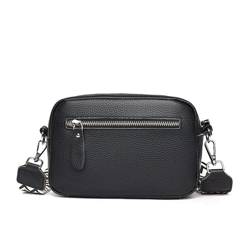 Moderne crossbody taske i læder til damer, ideel til travle dage, kombinerer stil med komfort.