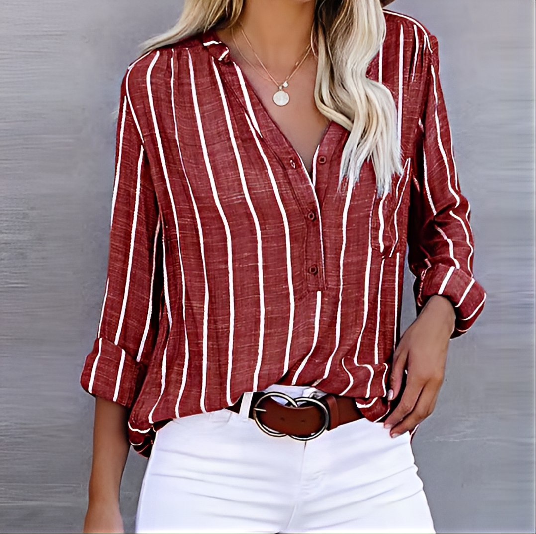 Dame stribet bluse for et stilfuldt og komfortabelt look. Moderne langærmet design, ideel til fashion og kvindetøj.