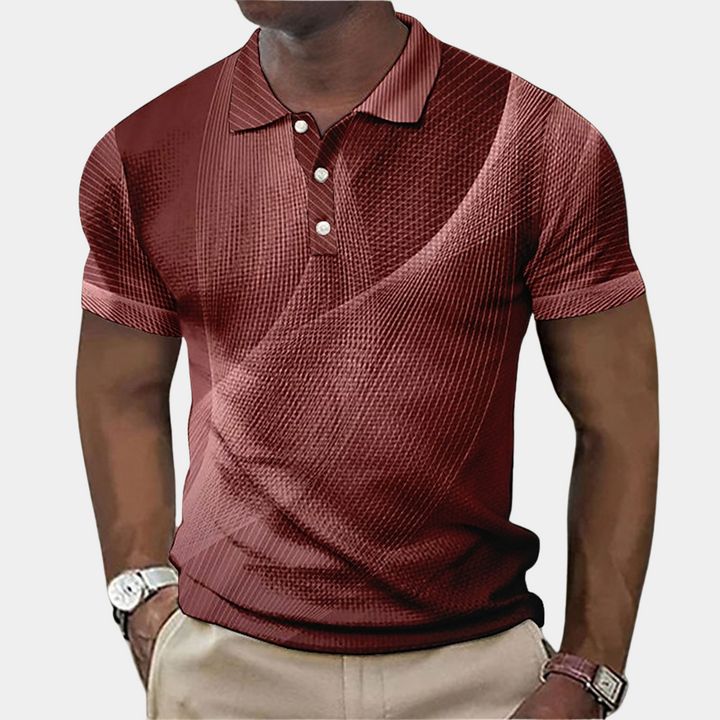 Stilfuld herrepoloshirt i blå med broderet detalje og poleret krave, ideel til både formelle og afslappede lejligheder.