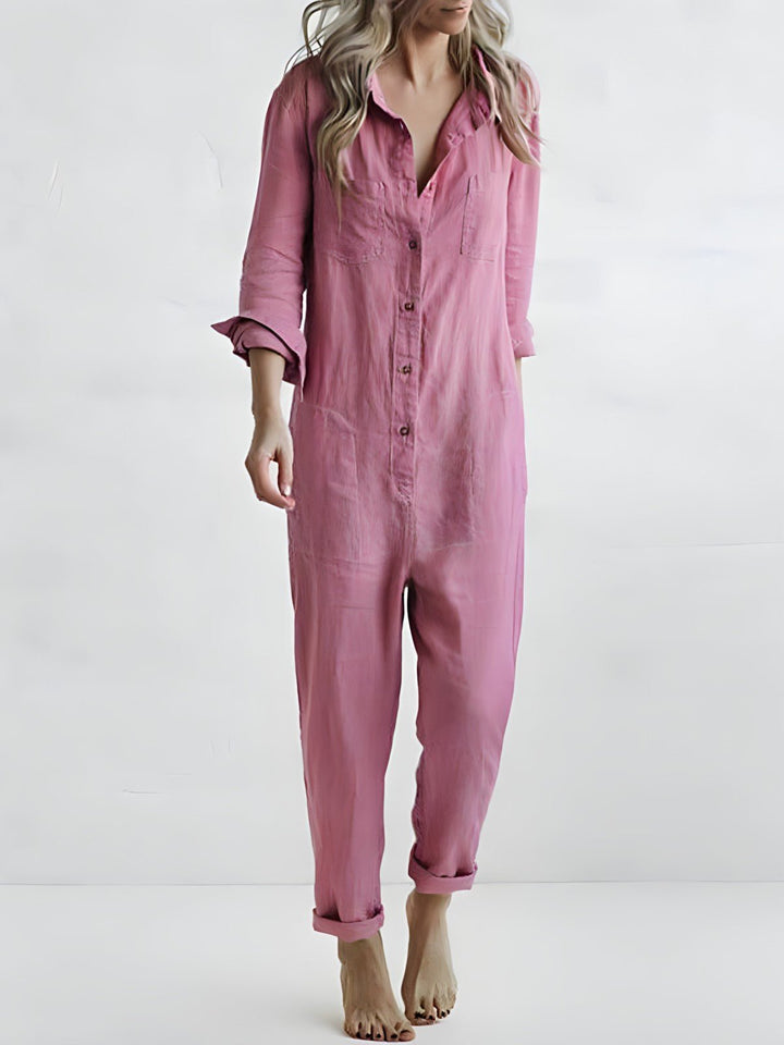 Stilfuld kvindejumpsuit i ensfarvet design. Komfortabel buksedragt perfekt til både hverdag og fest.