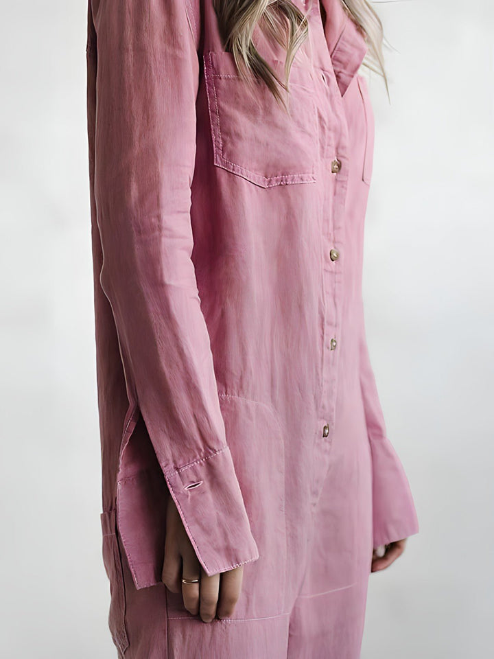 Elegant blå jumpsuit til kvinder. Moderne langærmet buksedragt, perfekt til stilfuld hverdag eller fest.