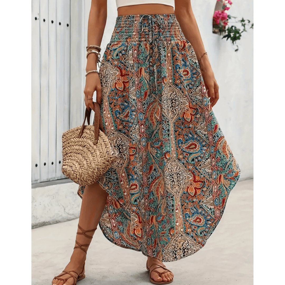 Stilfuld kvinders boheme maxi nederdel, ideel til afslappede sommerdage og strand. Komfortabel og flydende.