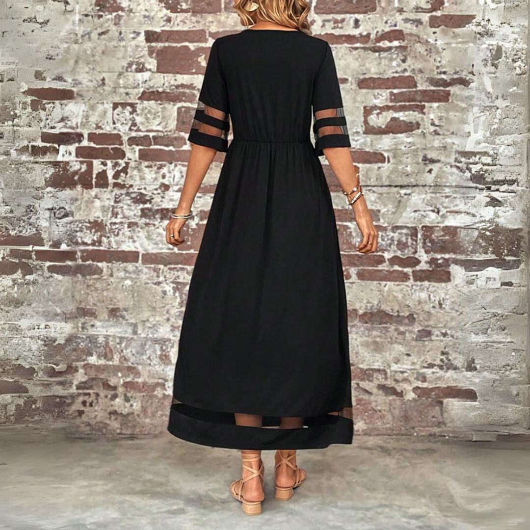Stilfuld sort lang maxikjole til kvinder, perfekt som elegant casual eller festlig kjole.