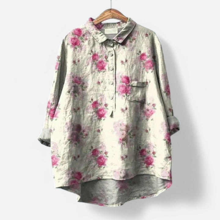 "Stilfuld løs pasform blomstret bluse til kvinder med elegante detaljer, perfekt til hverdags- og festlige lejligheder."