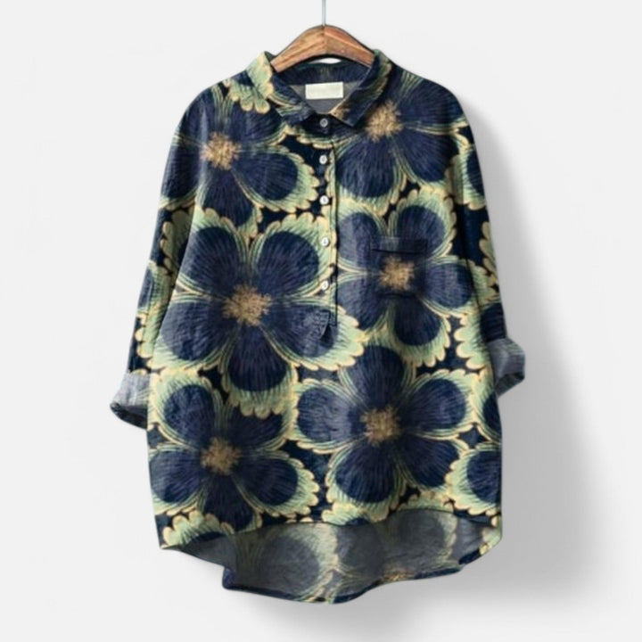 "Stilfuld løs pasform blomstret bluse til kvinder med elegante detaljer, perfekt til hverdags- og festlige lejligheder."