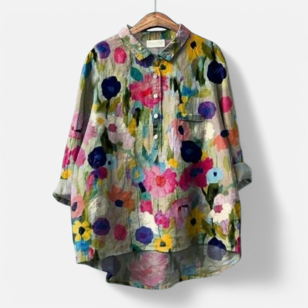 "Stilfuld løs pasform blomstret bluse til kvinder med elegante detaljer, perfekt til hverdags- og festlige lejligheder."