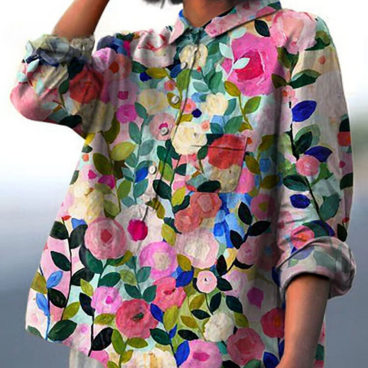 "Stilfuld løs pasform blomstret bluse til kvinder med elegante detaljer, perfekt til hverdags- og festlige lejligheder."