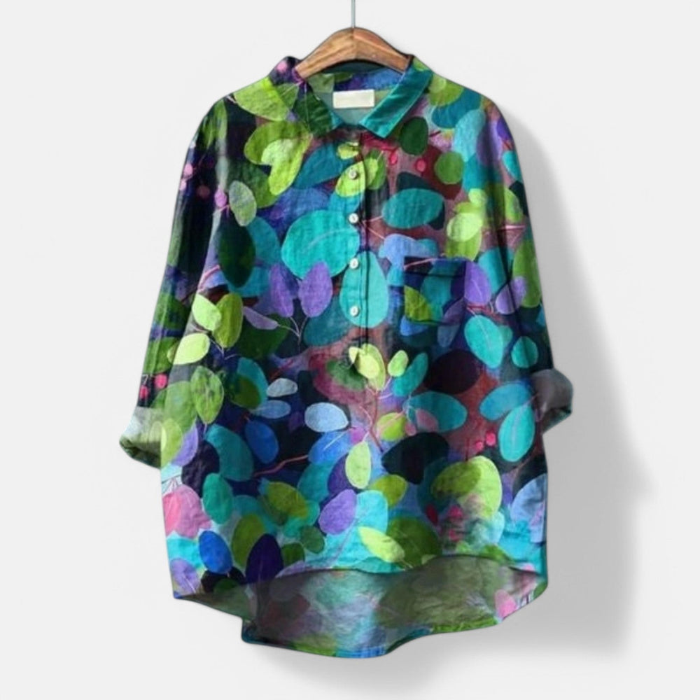 "Stilfuld løs pasform blomstret bluse til kvinder med elegante detaljer, perfekt til hverdags- og festlige lejligheder."