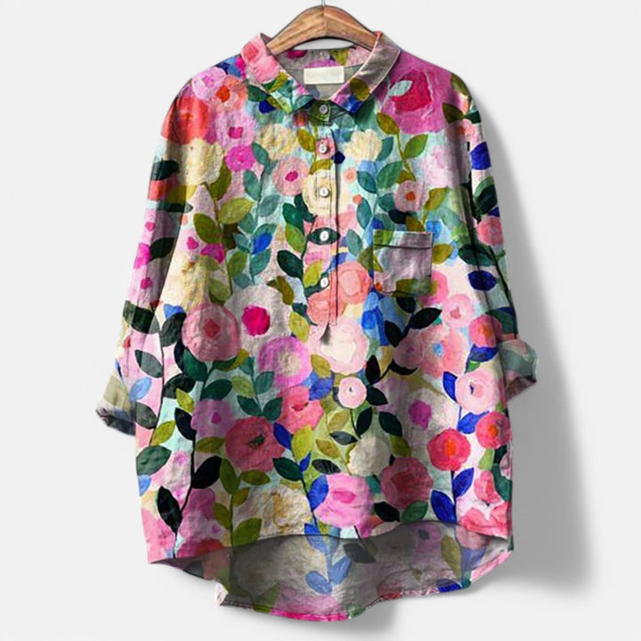 "Stilfuld løs pasform blomstret bluse til kvinder med elegante detaljer, perfekt til hverdags- og festlige lejligheder."