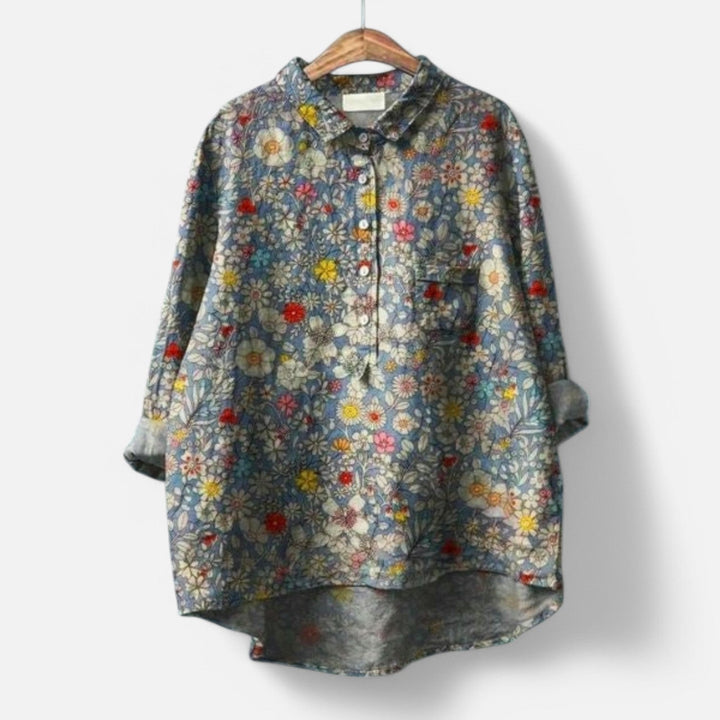 "Stilfuld løs pasform blomstret bluse til kvinder med elegante detaljer, perfekt til hverdags- og festlige lejligheder."