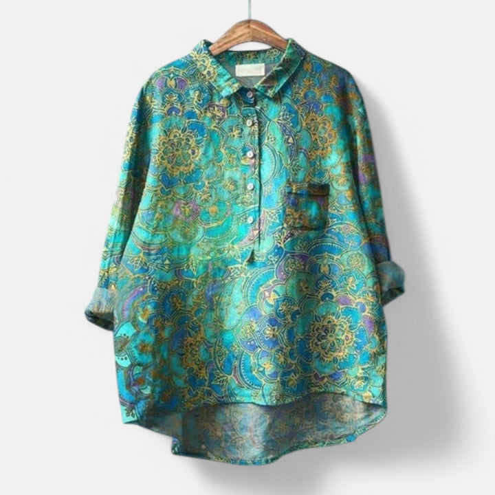 "Stilfuld løs pasform blomstret bluse til kvinder med elegante detaljer, perfekt til hverdags- og festlige lejligheder."