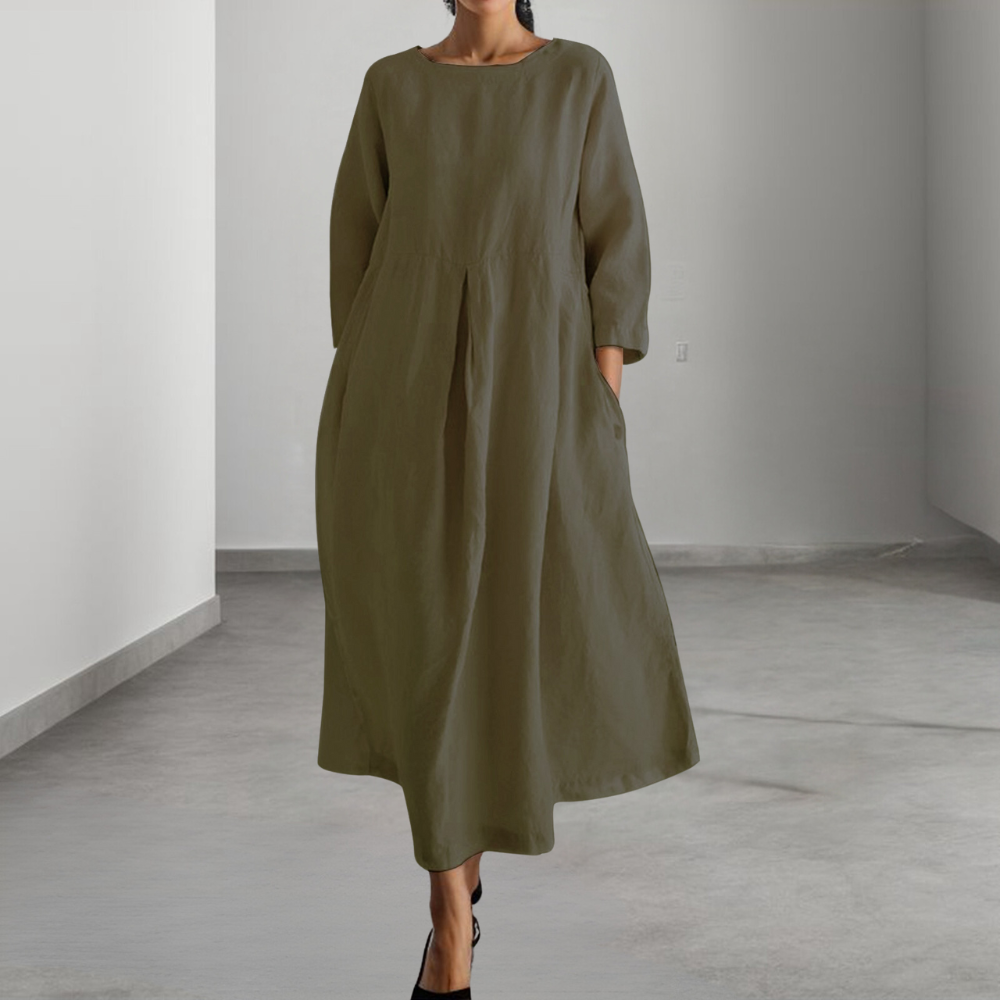 "Stilfuld sommerkjole i friske farver, løstsiddende design, perfekt til dag og aften, kvindekjole i åndbart materiale"