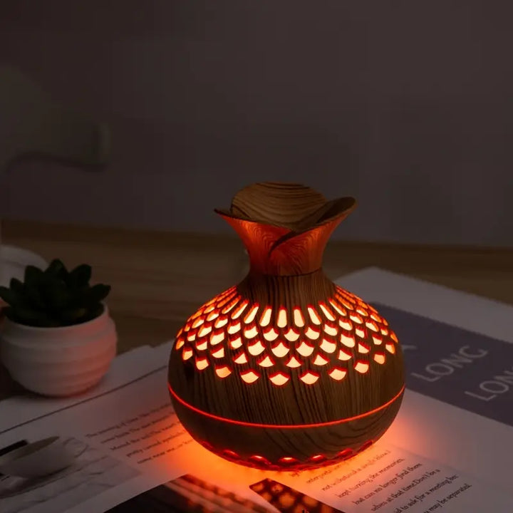 Moderne ultralyds diffuser i minimalistisk design, skaber ro og velduft for stress reduktion i hjemmet.