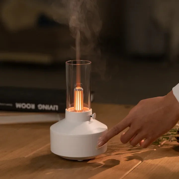 Ultralydsdiffuser til aromaterapi med automatisk sluk. Giver beroligende tåge og LED-lys for afslapning og hjemmehygge.