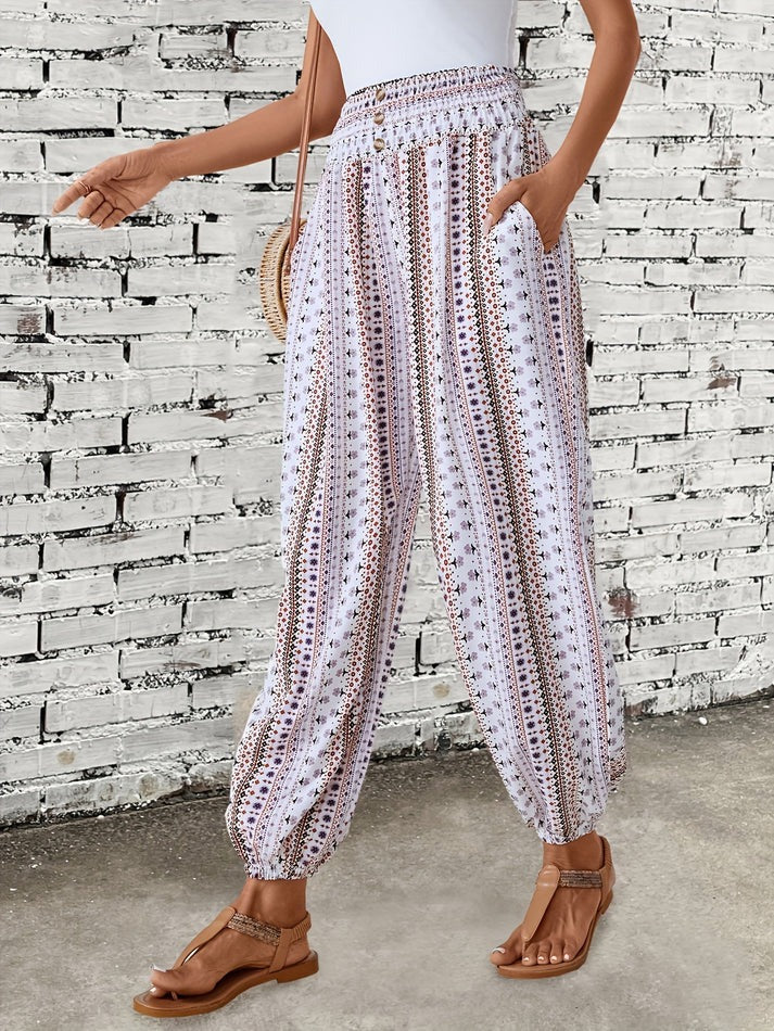 Alsidige boho bukser til kvinder med iøjnefaldende print. Stilfulde sommerbukser for enhver lejlighed.