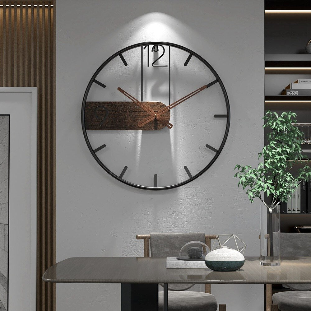 "Stilfuldt vægur i stål og valnød med 40 cm diameter, elegant design til moderne boligindretning, robust og sofistikeret."