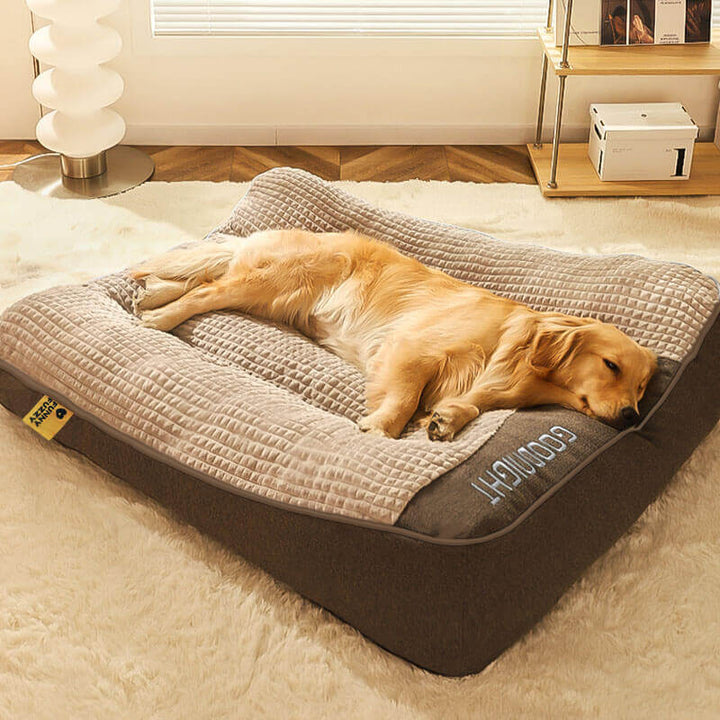 Stor ortopædisk hundeseng med nakkestøtte. Tyk pude giver optimal komfort til store hunde og aflaster led.
