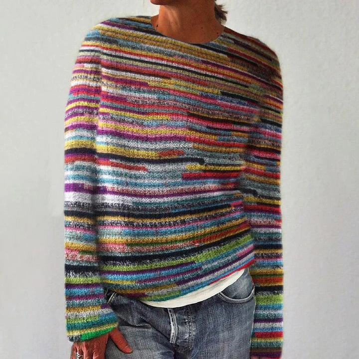 Strikket kvindetrøje i farverige striber, løs pasform, ideel til efterår og vinter, legende og iøjnefaldende design.