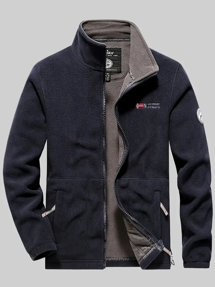 "Termisk fleece jakke i sort, perfekt til udendørs aktiviteter. Blødt stof, moderne design, fremragende isolering."