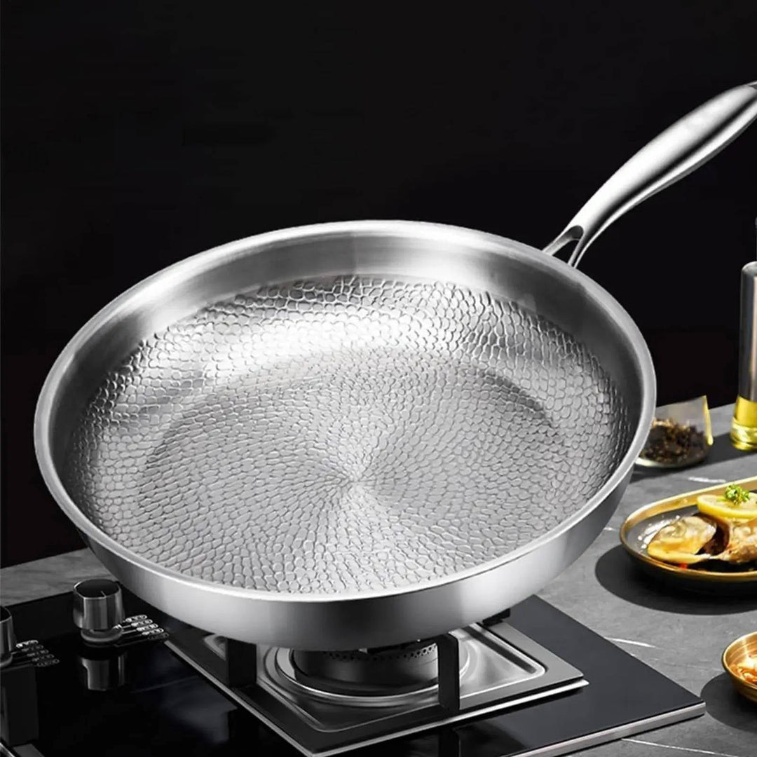 Giftfri non-stick stegepande i titanium designet til sundere måltider og problemfri rengøring. Unisex model.