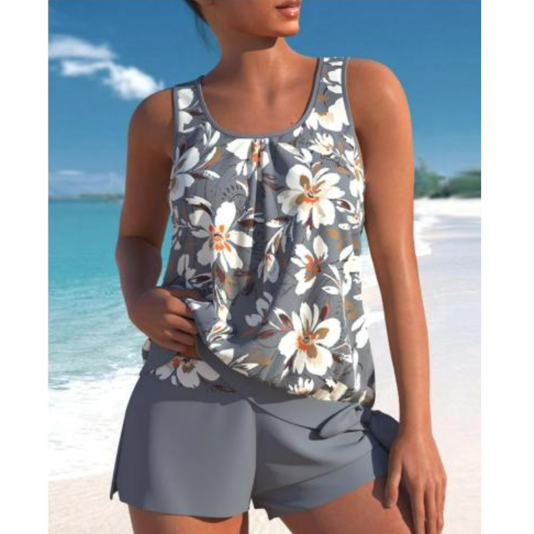 "Tofarvet tankini med blomster mønster, trådløs bh. Perfekt strandtøj til kvinder, kombinerer stil og komfort."