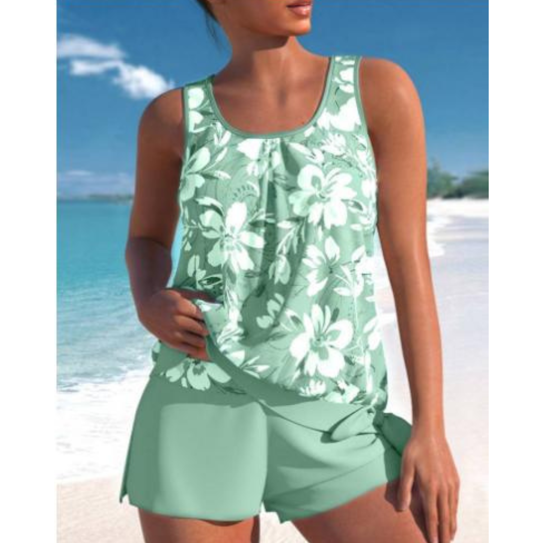 "Tofarvet tankini med blomster mønster, trådløs bh. Perfekt strandtøj til kvinder, kombinerer stil og komfort."