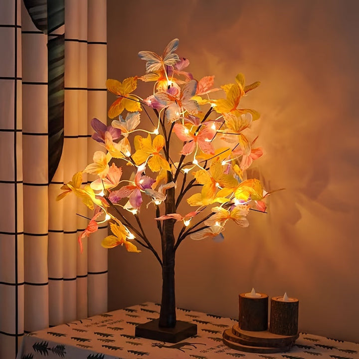 Miljøbillede af BranchLume trådløs bordlampe på en skænk, der skaber elegant stemningslys.