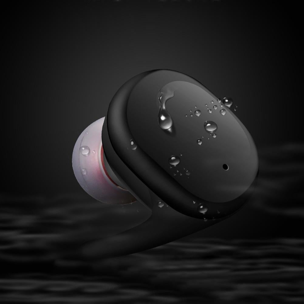 Bærbare trådløse in-ear høretelefoner i sort med lang spilletid, ideel til rejser og pendling.