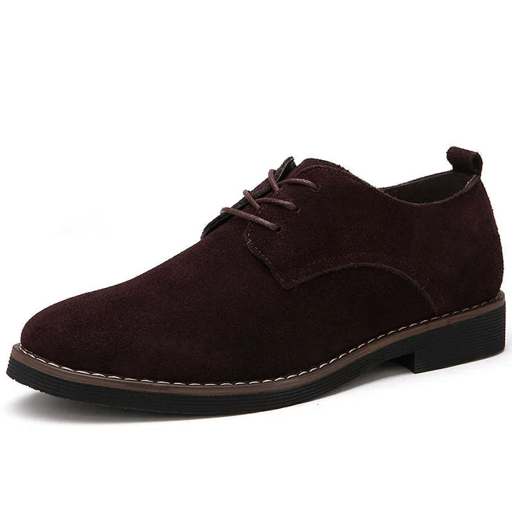Trendy Oxford sko i sort læder til mænd og kvinder, moderne design med klassisk snørebånd, perfekt til formelle lejligheder.