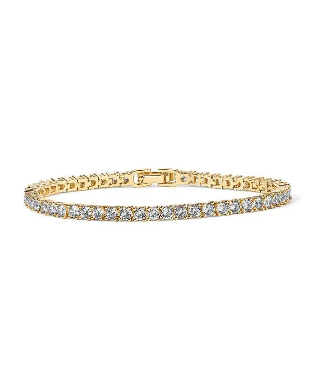Tyndt dame tennisarmbånd i guld med funklende zirkonia. Elegant guldsmykke, perfekt gave til hende.