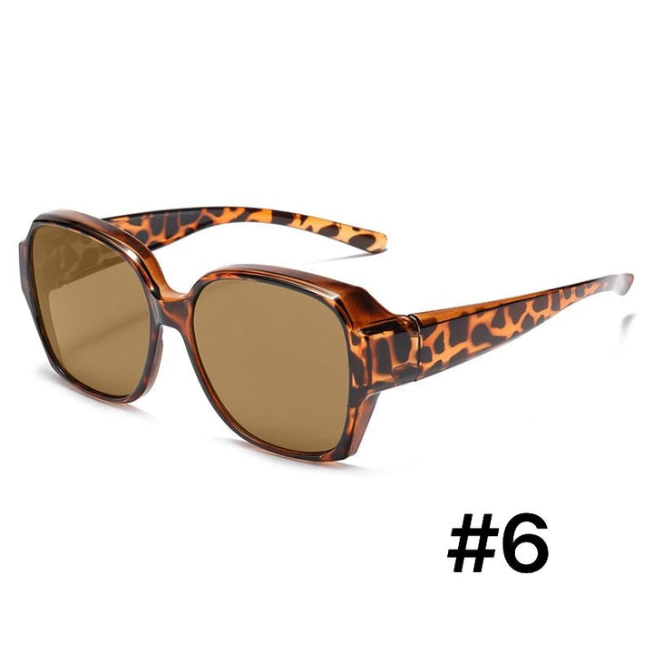 Klart syn med unisex clip-on solbriller; polariseret linse giver total UV-beskyttelse.