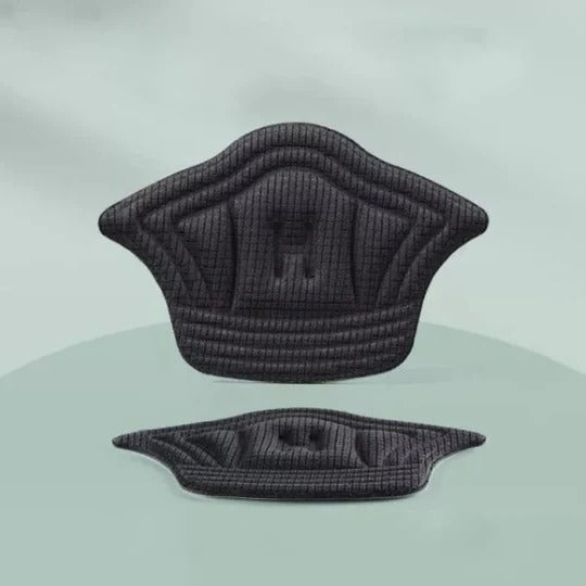 Komfortable hælindlæg til unisex, set fra siden, viser polstret design for maksimal hælbeskyttelse & sikker pasform.