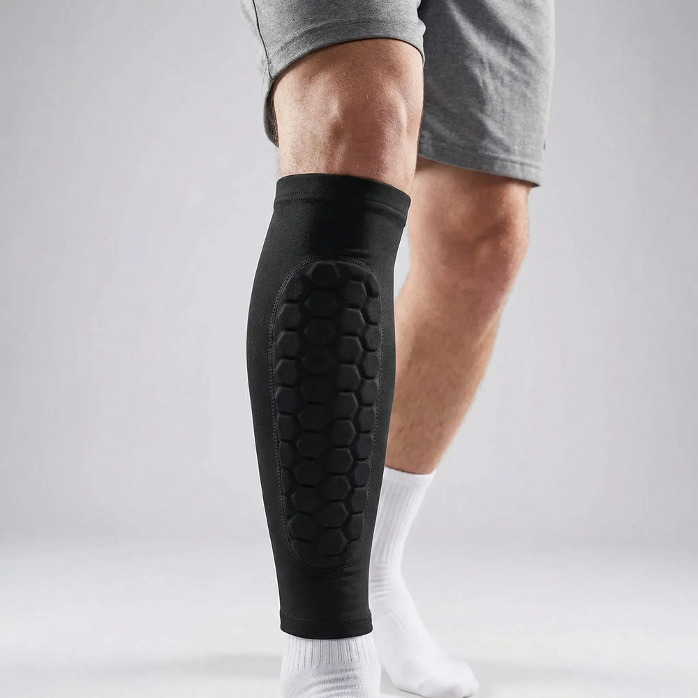 Åndbare unisex fodbold benskinner med pude og honeycomb-beskyttelse for optimal sikkerhed.