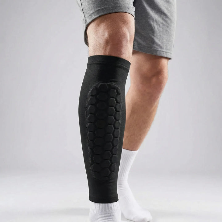 Åndbare unisex fodbold benskinner med pude og honeycomb-beskyttelse for optimal sikkerhed.