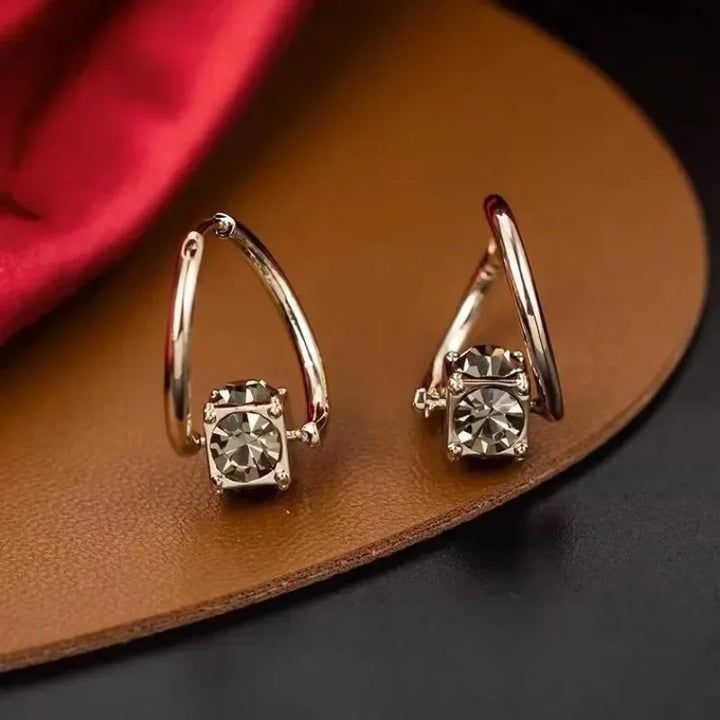 Elegante unisex magnetterapi øreringe, der støtter kroppens afgiftning.
