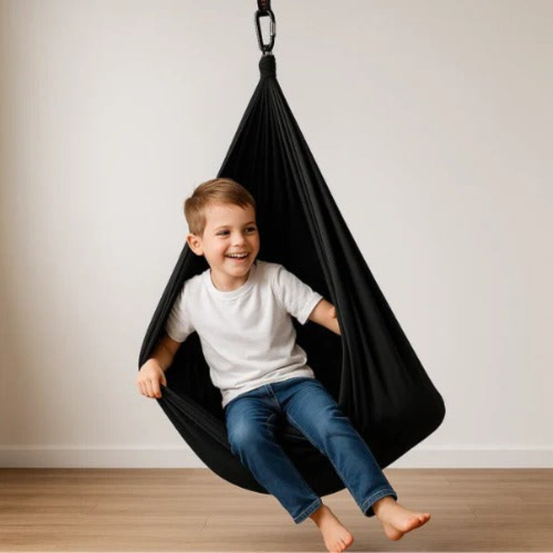 Autisme gynge for sensorisk stimulering og ro, en tryg terapi gynge til indendørs brug.
