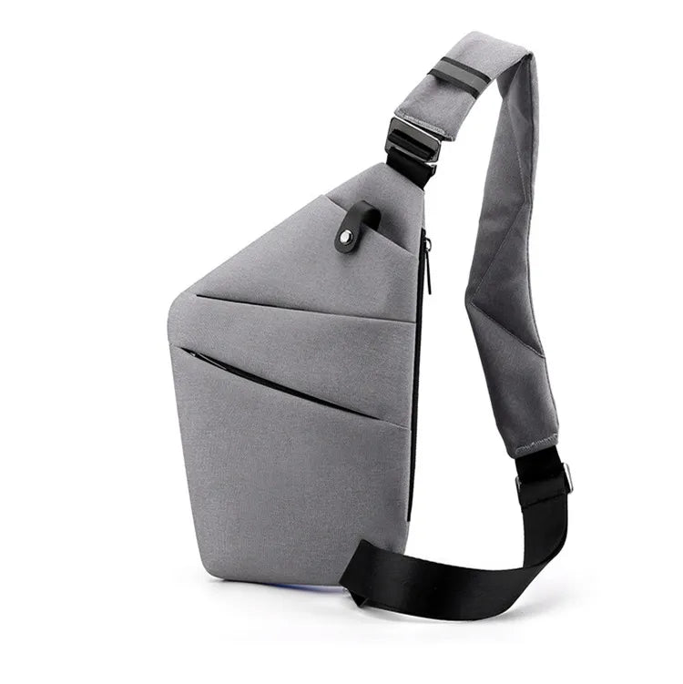Grå mini crossbody taske til hverdag, med plads til mobil og sikker organisering af dine vigtigste ejendele.