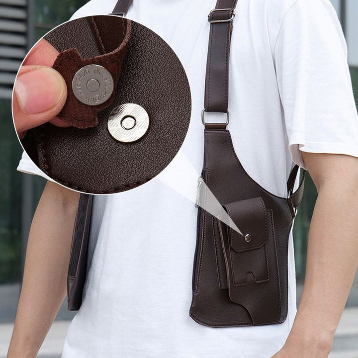 Slank sort PU-læder skuldertaske, unisex design. Tyverisikker rejsetaske perfekt til pendling.