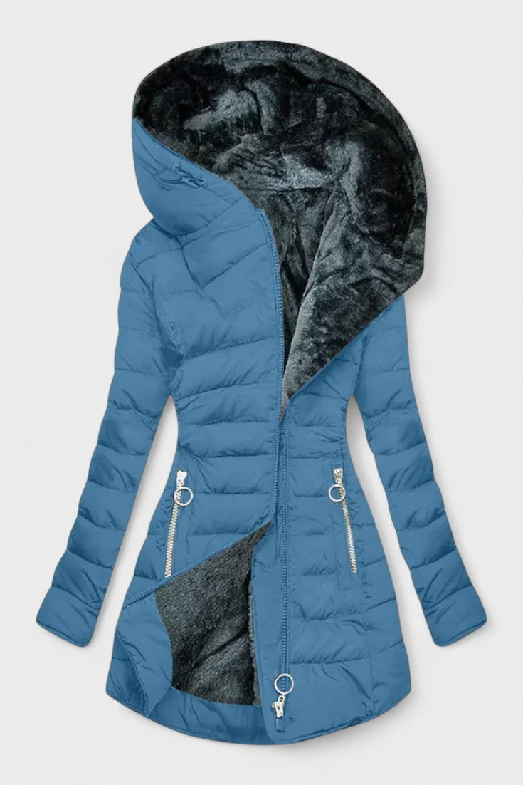 Elegant og feminin damejakke i kunstpels, et must-have til en stilfuld vintergarderobe.