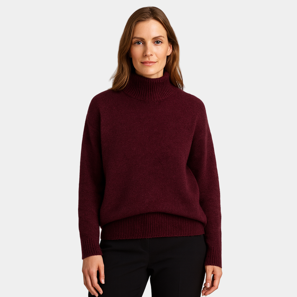 Elegant dametrøje med rullekrave i strik. Ideel til lagpålag og stilfuld damemode vinteren igennem.