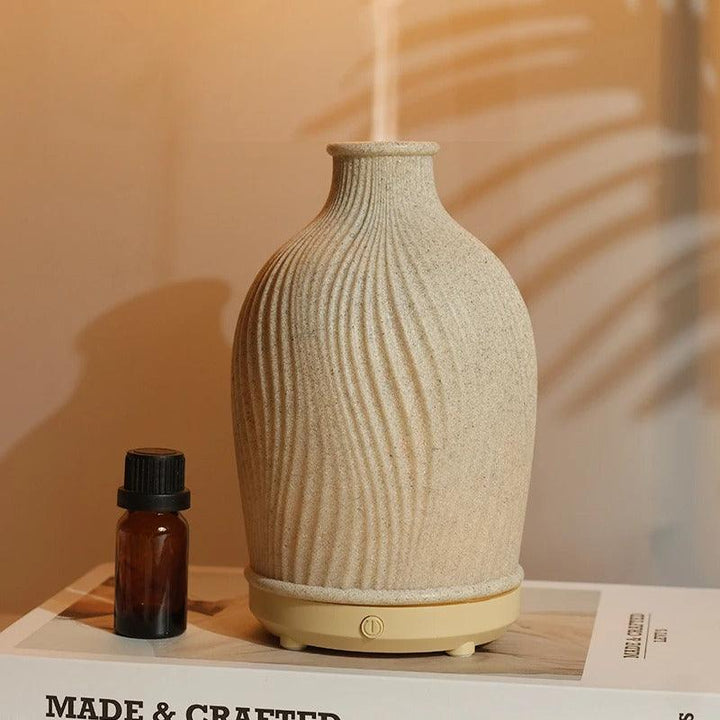 "Vaseformet æterisk olie-luftfugter i boho-stil, diffusertåge, blødt lys, ideel til hjemmeindretning, let betjening."